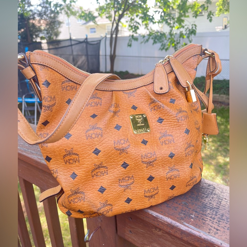 Authentic MCM small congnac hobo shoulder bag